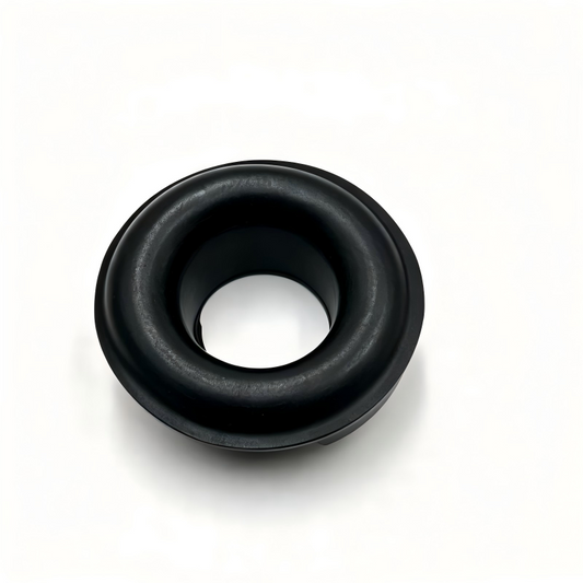 Rear coil spring lower pad, black rubber bushing with center hole (top view)