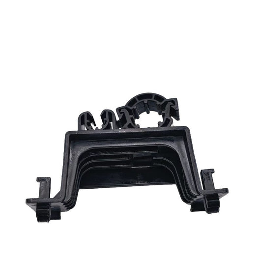 Black A/C pipe mounting bracket with two side clips and central mounting opening