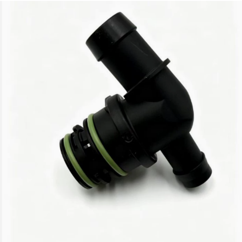 Black plastic engine check valve with green-ring seal and angled hose ports