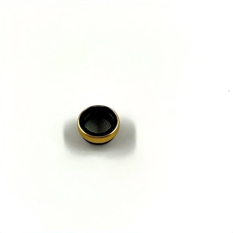 Round oil screen insert with fine mesh, black center and gold-colored outer ring
