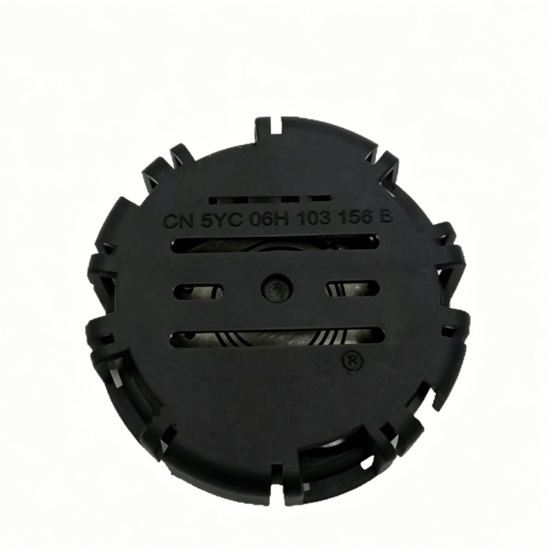 Black vacuum check valve with circular plastic housing, side slots, and engraved text