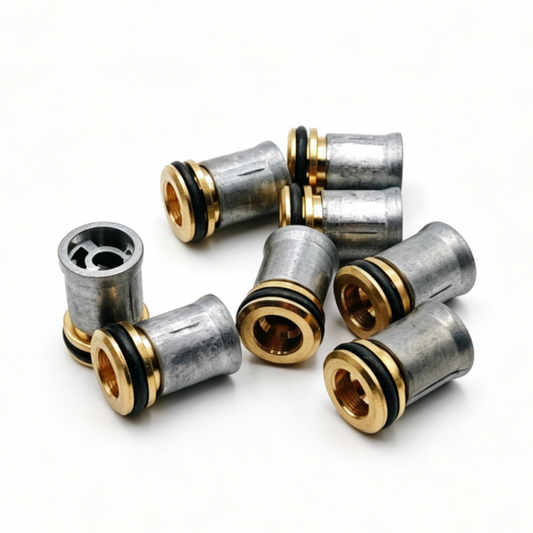 Engine check valve set with gray metal bodies and brass threaded ends, 4 pieces.