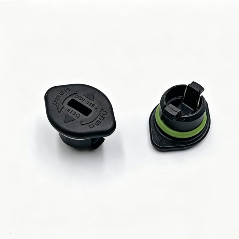 Valve cover plug with embossed black cap and green sealing ring, side view