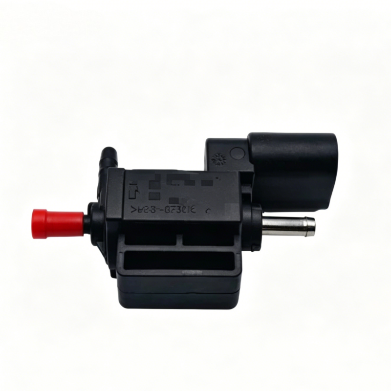 Black intake manifold solenoid valve with red vacuum port and electrical connector pins