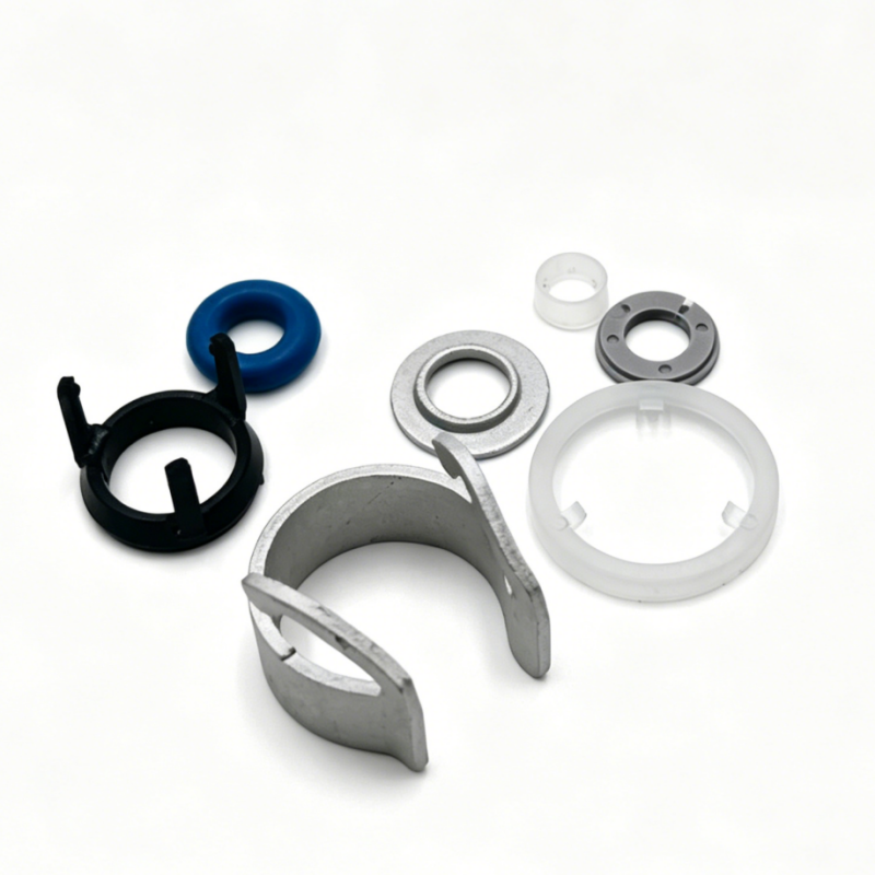 Fuel injector repair kit parts: metal clips, O-rings, washers and seals in mixed colors