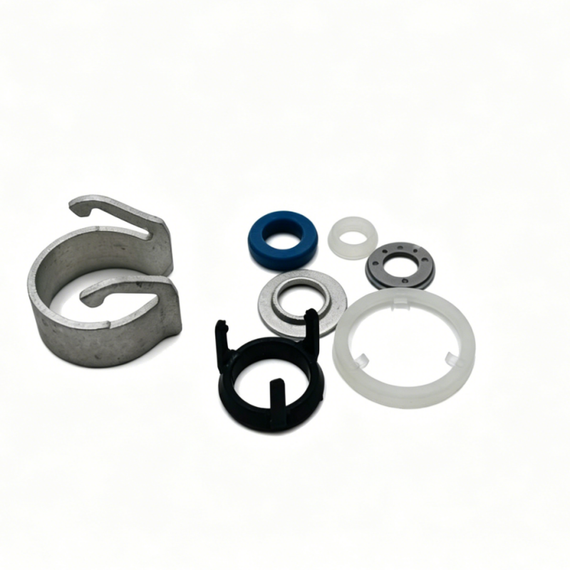 Fuel injector repair kit parts with two metal clamps, blue O-ring, black holder and white seal