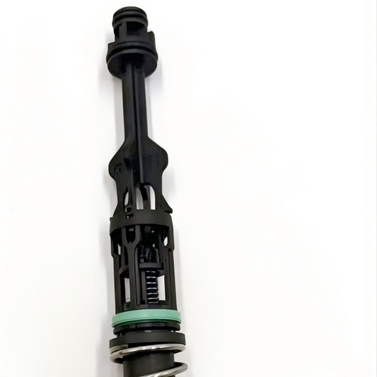 Oil filter housing tube connector with green seal and black plastic housing