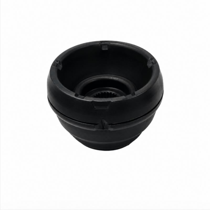 Black front strut mount bushing viewed from underside, showing circular opening