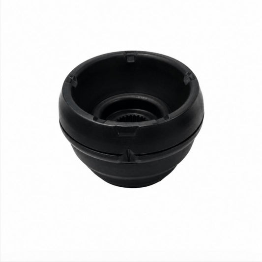 Black front strut mount bushing viewed from underside, showing circular opening
