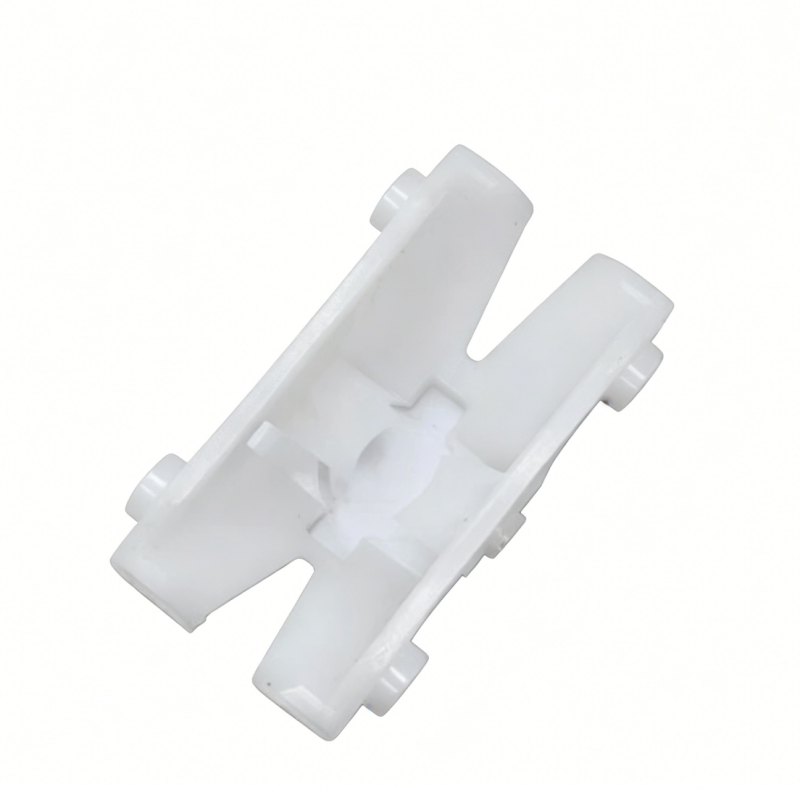 White plastic brake pedal retainer bracket with mounting clips