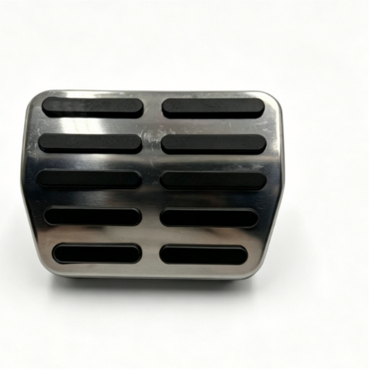 Brake pedal pad with black rubber grip slots, flat front view