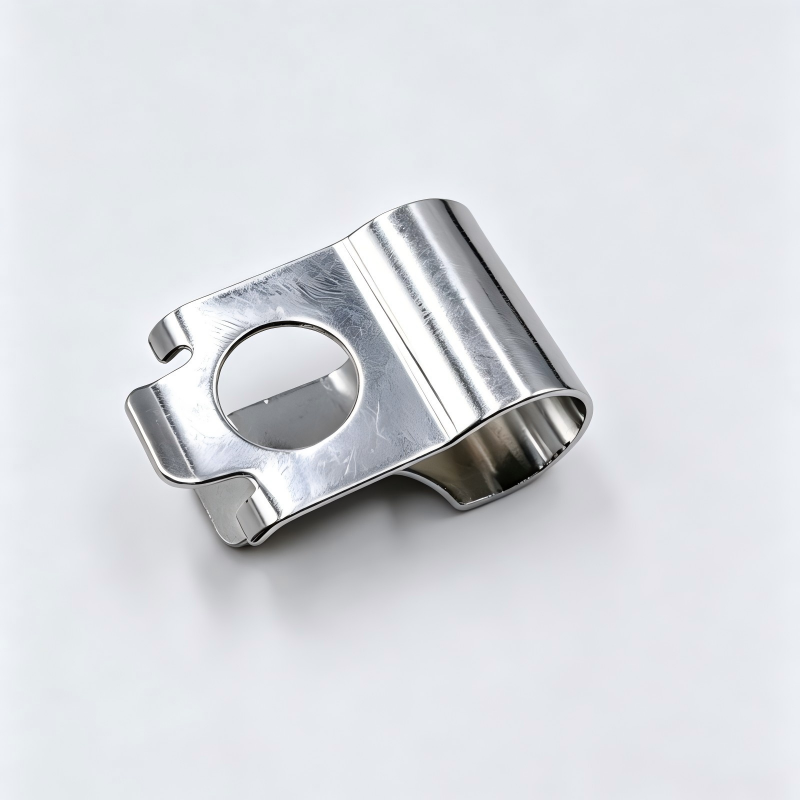 Metal silver turbo wastegate actuator clip with circular opening and mounting tab