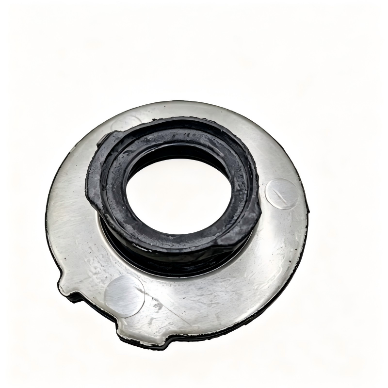 Automotive coil spring pad, silver metal base with black rubber ring and center hole