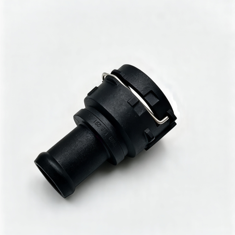 Heater coolant hose connector with black plastic body and metal spring clip
