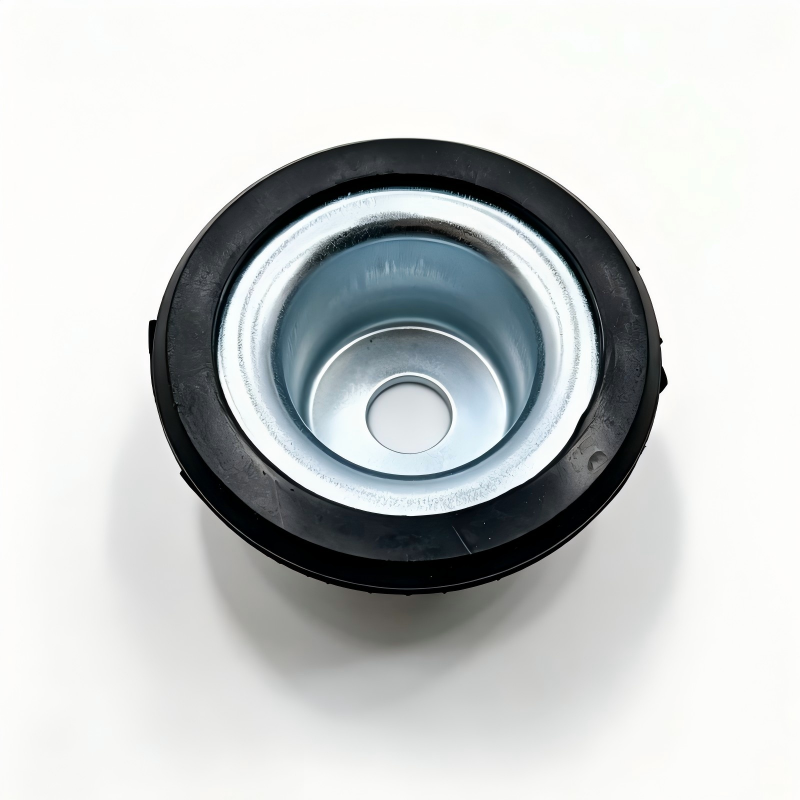 Front shock absorber bump stop with metal cup insert and black rubber isolator