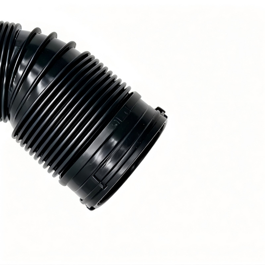 Black corrugated air intake hose with ribbed flexible section and end flange