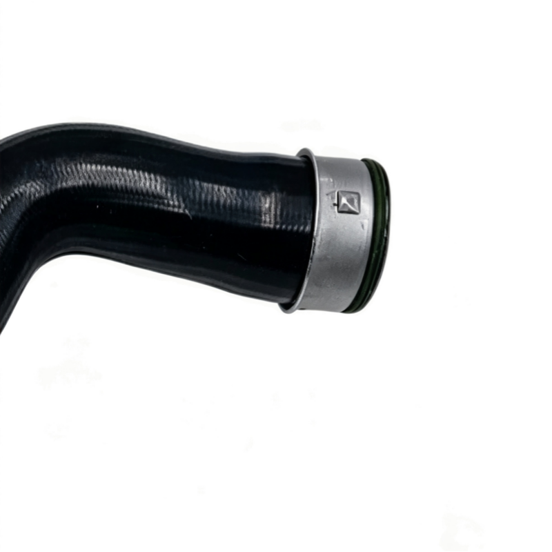 Black turbo boost pipe with metal end flange and green seal ring