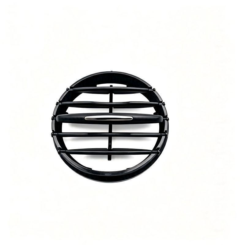 Black circular air vent control grille with horizontal and vertical slats