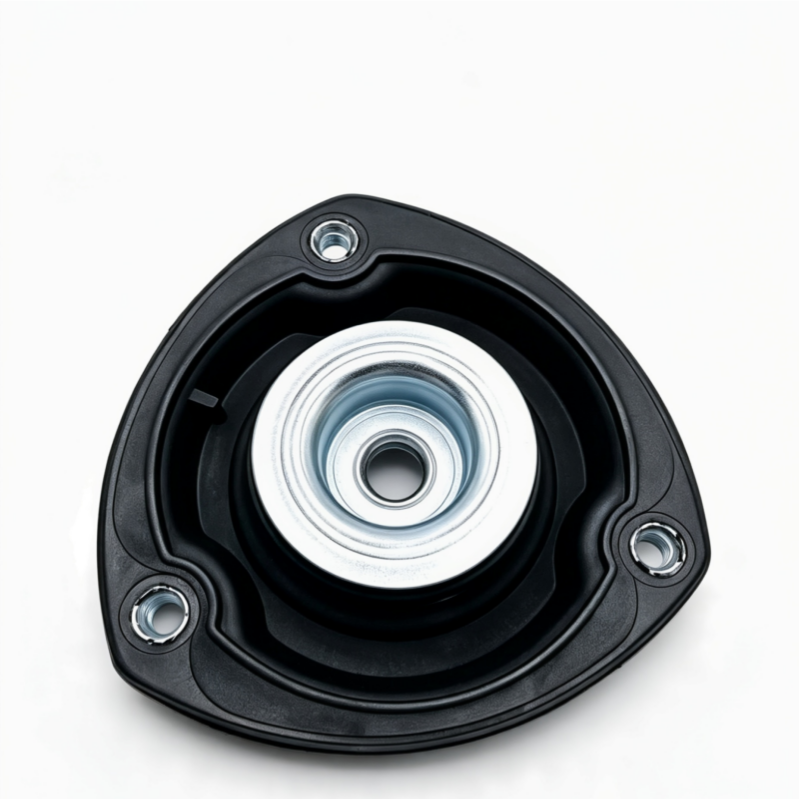 Front strut mount assembly with black rubber base and silver metal bearing plate