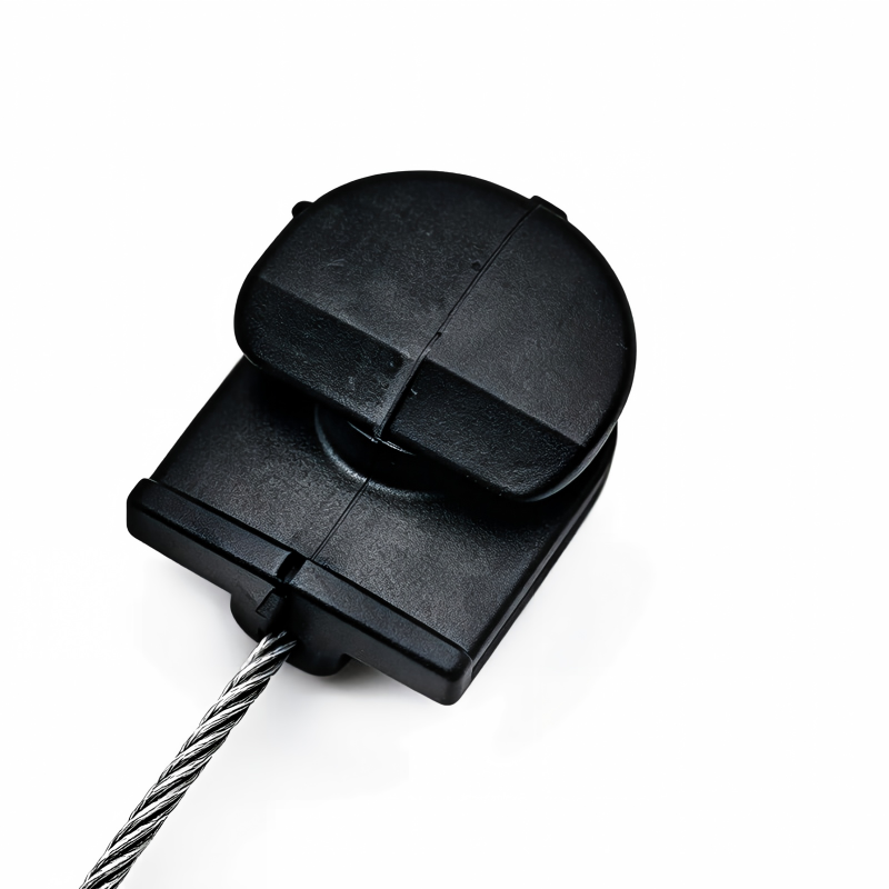 Black door lock cable with plastic housing and braided metal cable