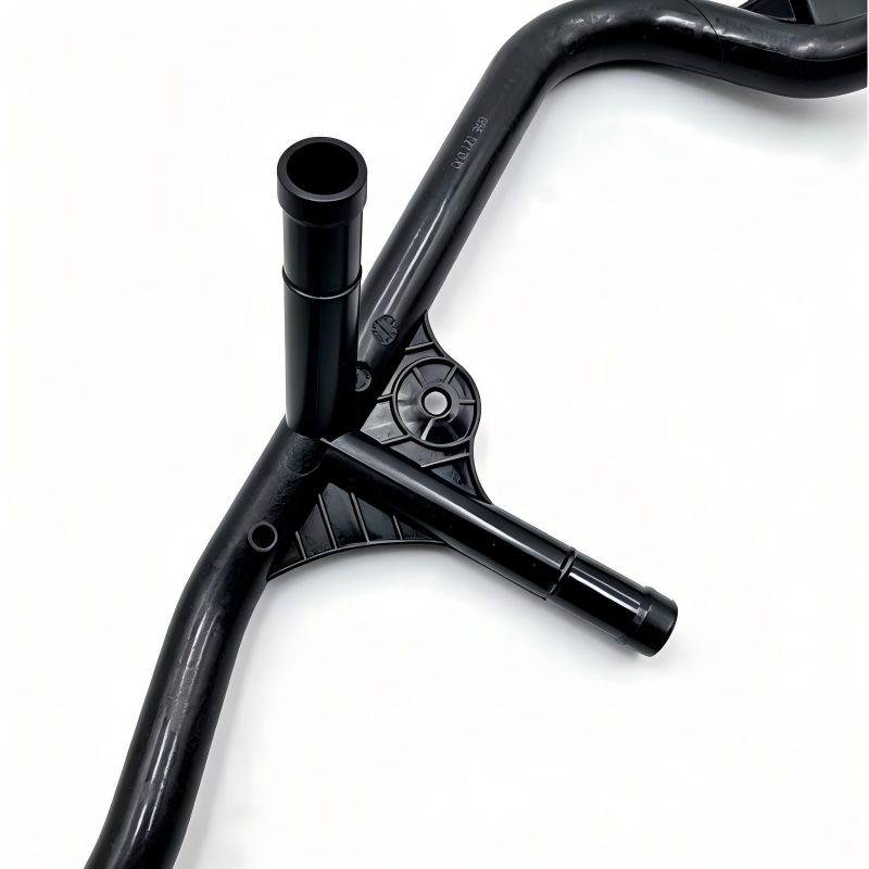 Black engine coolant pipe with molded bends and outlet