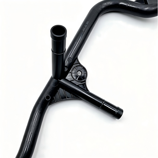 Black engine coolant pipe with molded bends and outlet