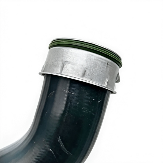 Turbo boost pipe with black rubber hose, green seal ring, and silver metal coupler