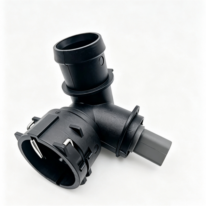 Black coolant hose junction with molded clamps and angled outlet