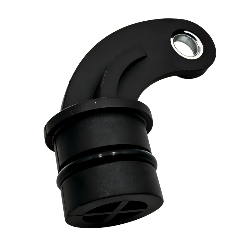 Black engine block plug with circular metal insert and curved outlet