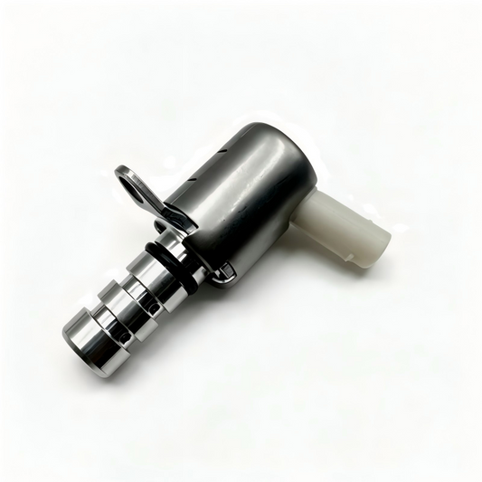 Oil pressure control valve with metal housing and white plastic electrical connector