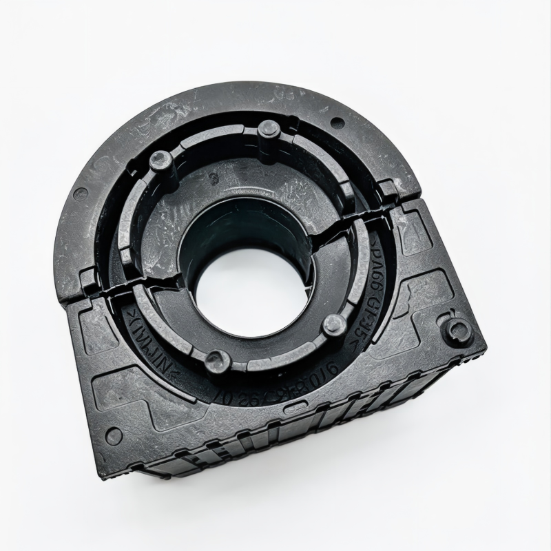 Stabilizer bar bushing with dark rubber inner insert and metal housing clamp bracket