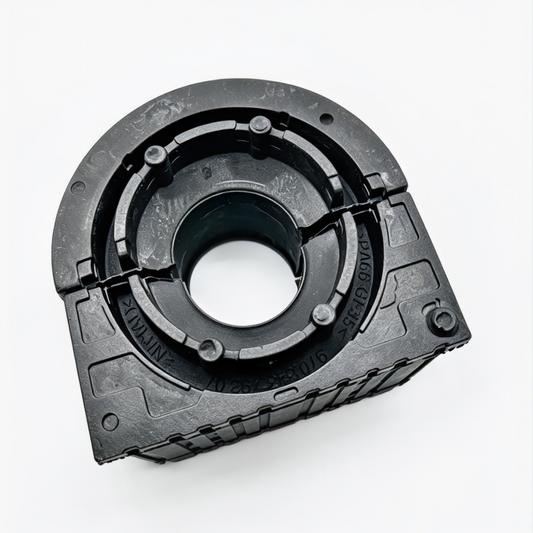 Stabilizer bar bushing with dark rubber inner insert and metal housing clamp bracket