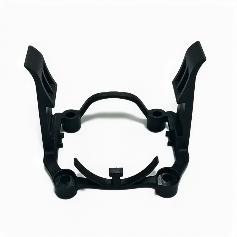 Throttle body bracket, black plastic with mounting holes and two side arms