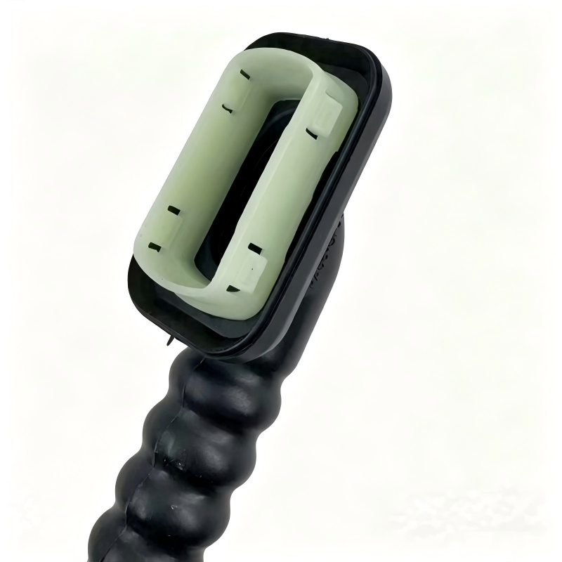Tailgate wiring harness sleeve with ribbed black cover and light green connector end