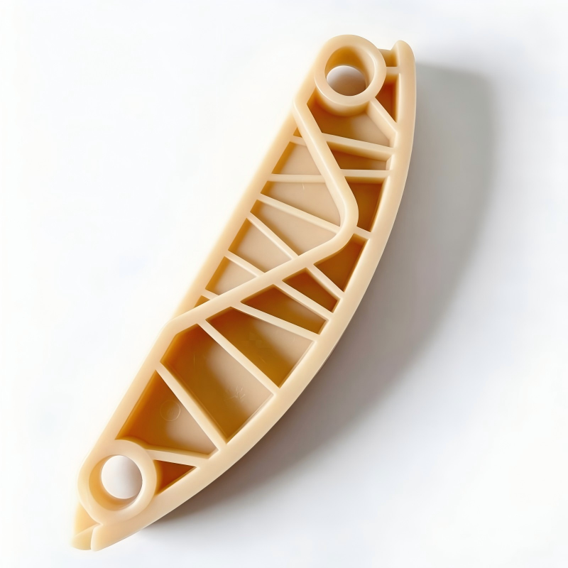 Timing chain guide rail, beige plastic with circular mounting holes and ribbed channels