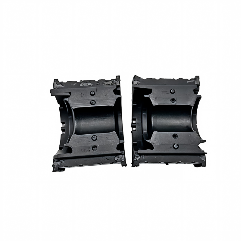 Black stabilizer bar bushing bracket pair with mounting holes and circular sleeve