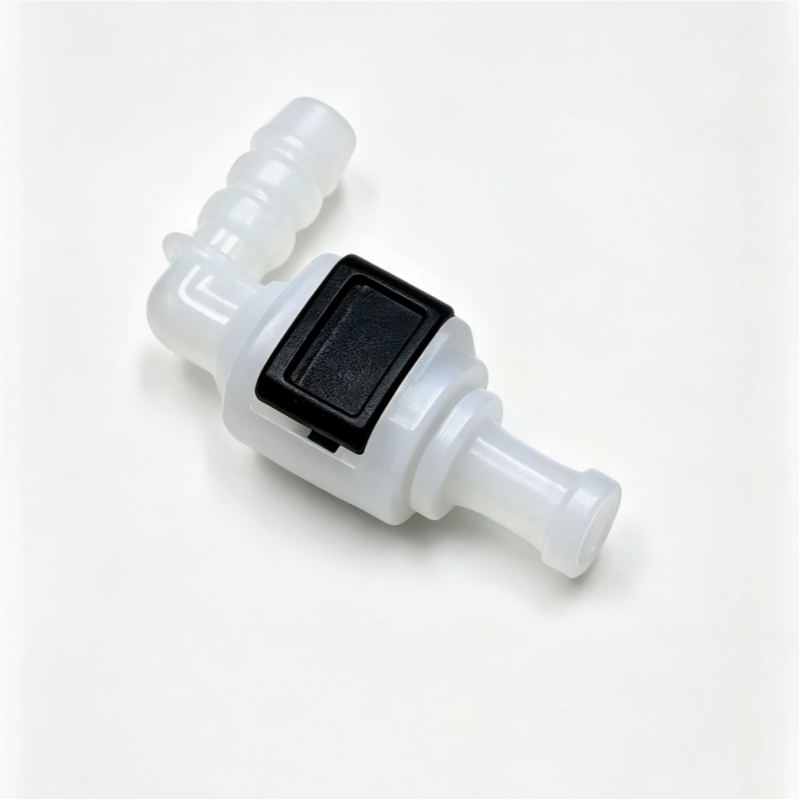 White coolant hose connector with black square insert, close-up view