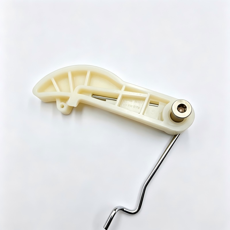 Timing chain tensioner with cream plastic guide and metal crank handle.