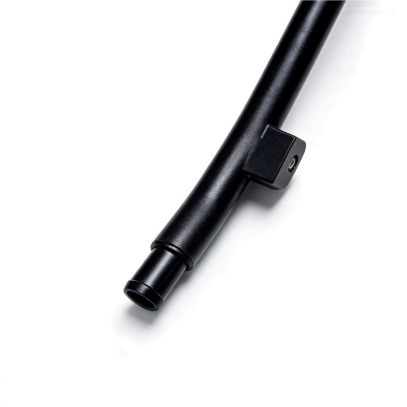 Black coolant hose with plastic mounting bracket and ribbed connector port
