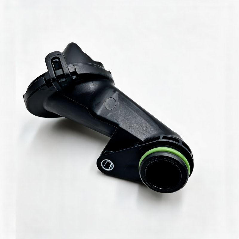Oil pump pickup screen with black housing and green O-ring, angled view