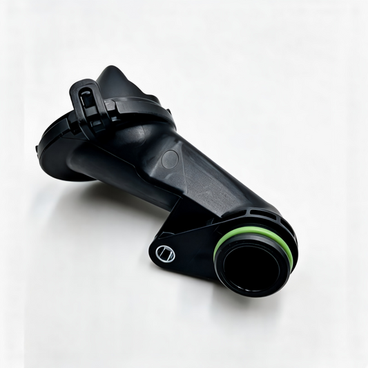 Oil pump pickup screen with black housing and green O-ring, angled view