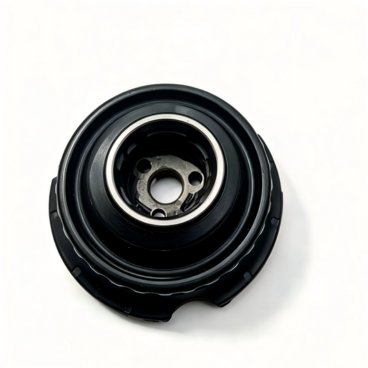Suspension rubber mount with black circular housing and metal center plate