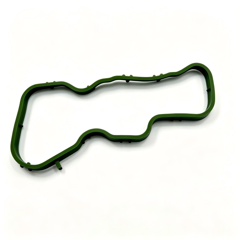 Left intake manifold gasket, green molded seal with wavy profile and bolt holes