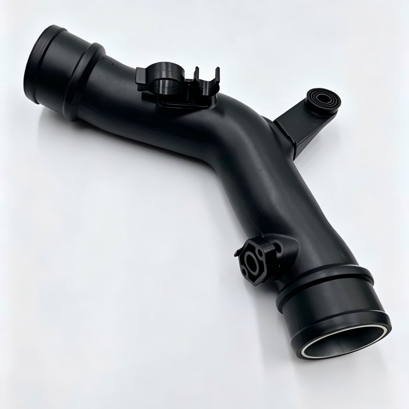 Black turbocharger boost pipe with hose couplers and mounting bracket