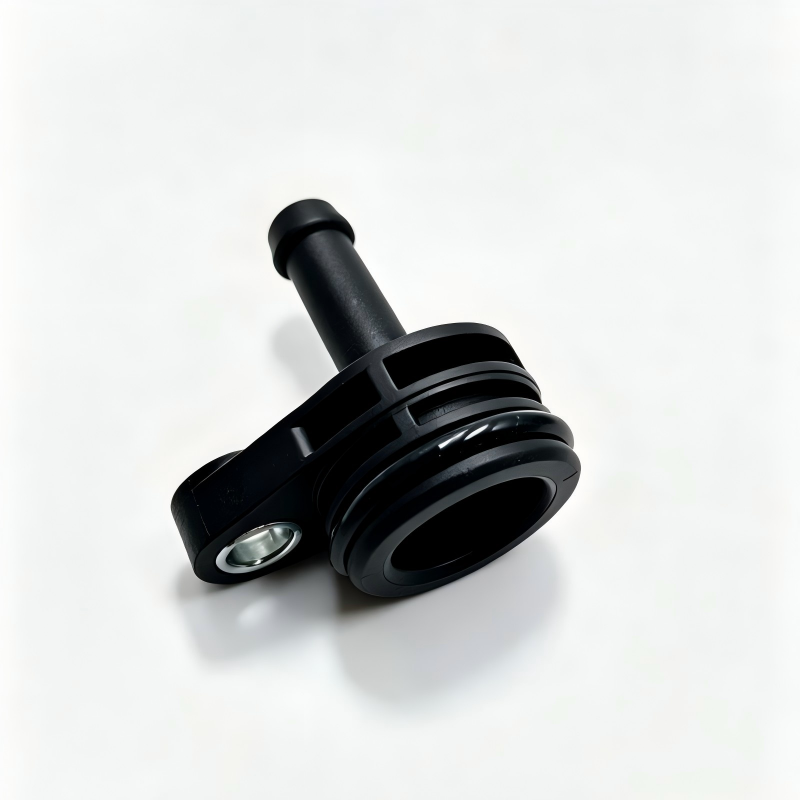 Black coolant hose connector with metal mounting hole and ribbed circular base