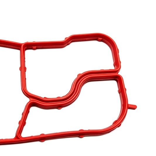 Oil cooler seal gasket, red molded rubber with sealing channels and cutouts