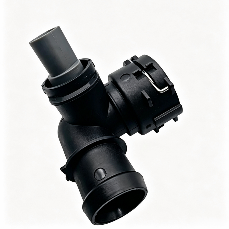 Black coolant hose junction with two hose ends and plastic retaining clip