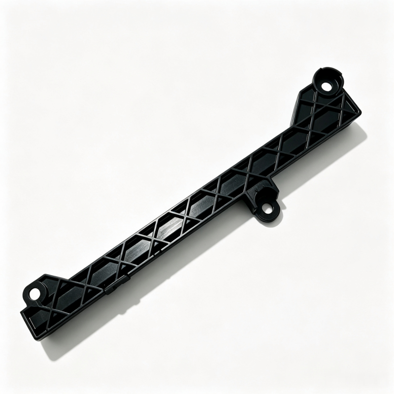 Black fuel line support bracket with grid reinforcement and mounting eye at end