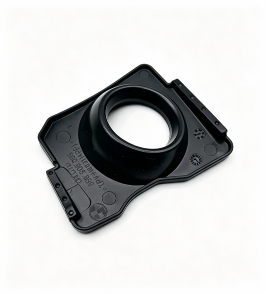 Black ignition coil boot with circular opening and side mounting tabs