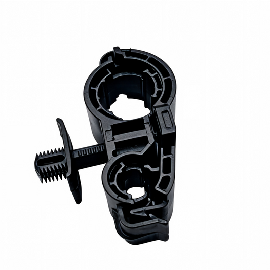 Black A/C pipe bracket housing with threaded fastener and mounting tab